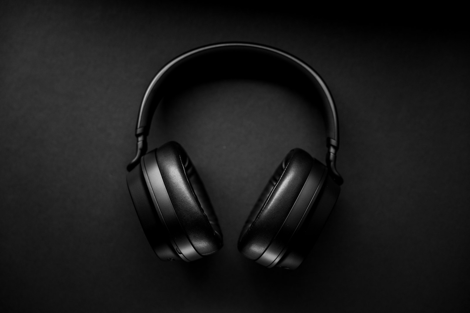 Black over-ear headphones, the pair you check for wear